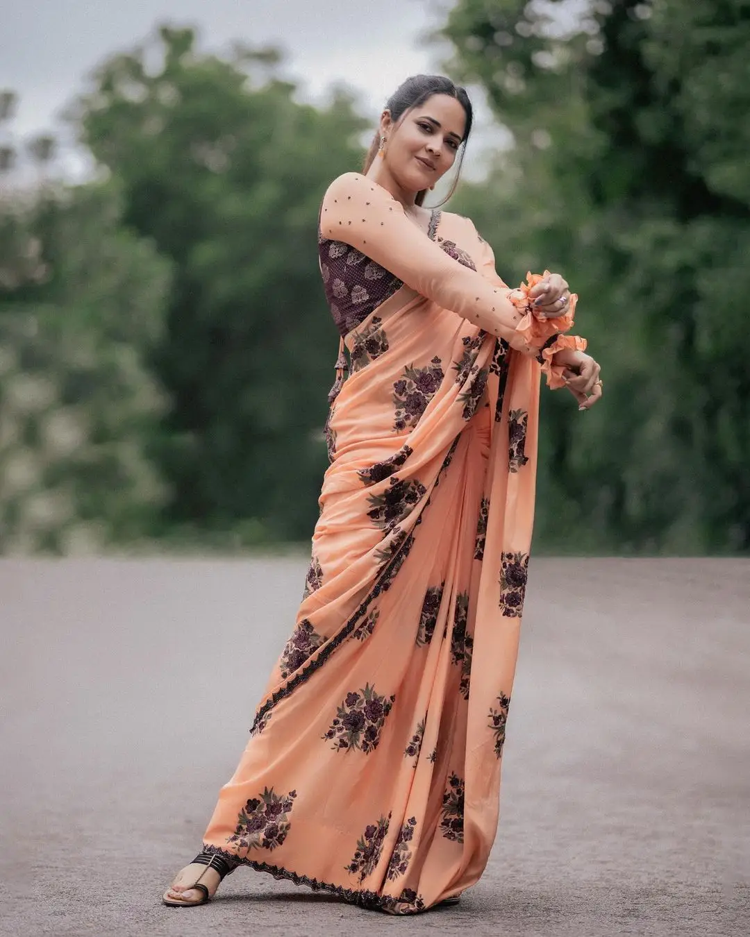 Anasuya Bharadwaj Wearing Beautiful Earrings Orange Saree Blouse